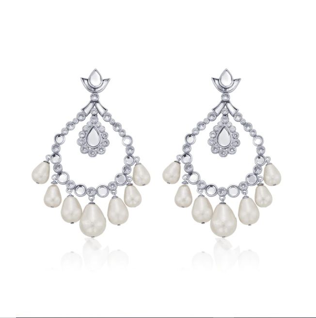 Our favorite statement earrings to spice up an ensemble, from pearls to color.