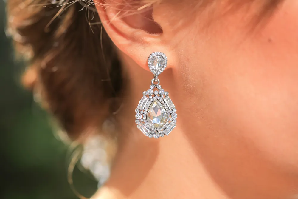 Choose lightweight earrings which are heavy in look