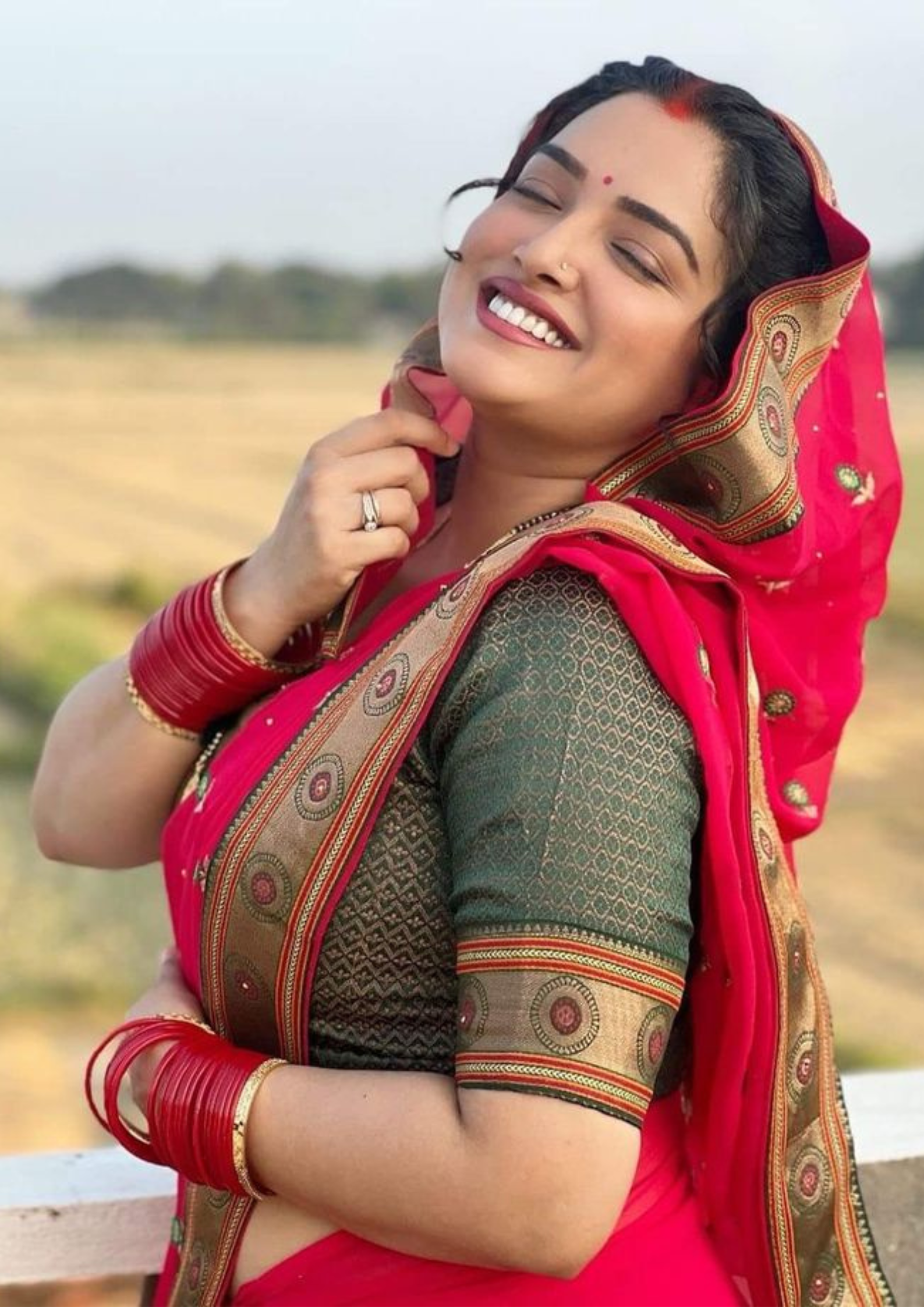 Vertical HD portrait of Bhojpuri actress resembling Amrapali Dubey in traditional Dress with Sexy and hot looks