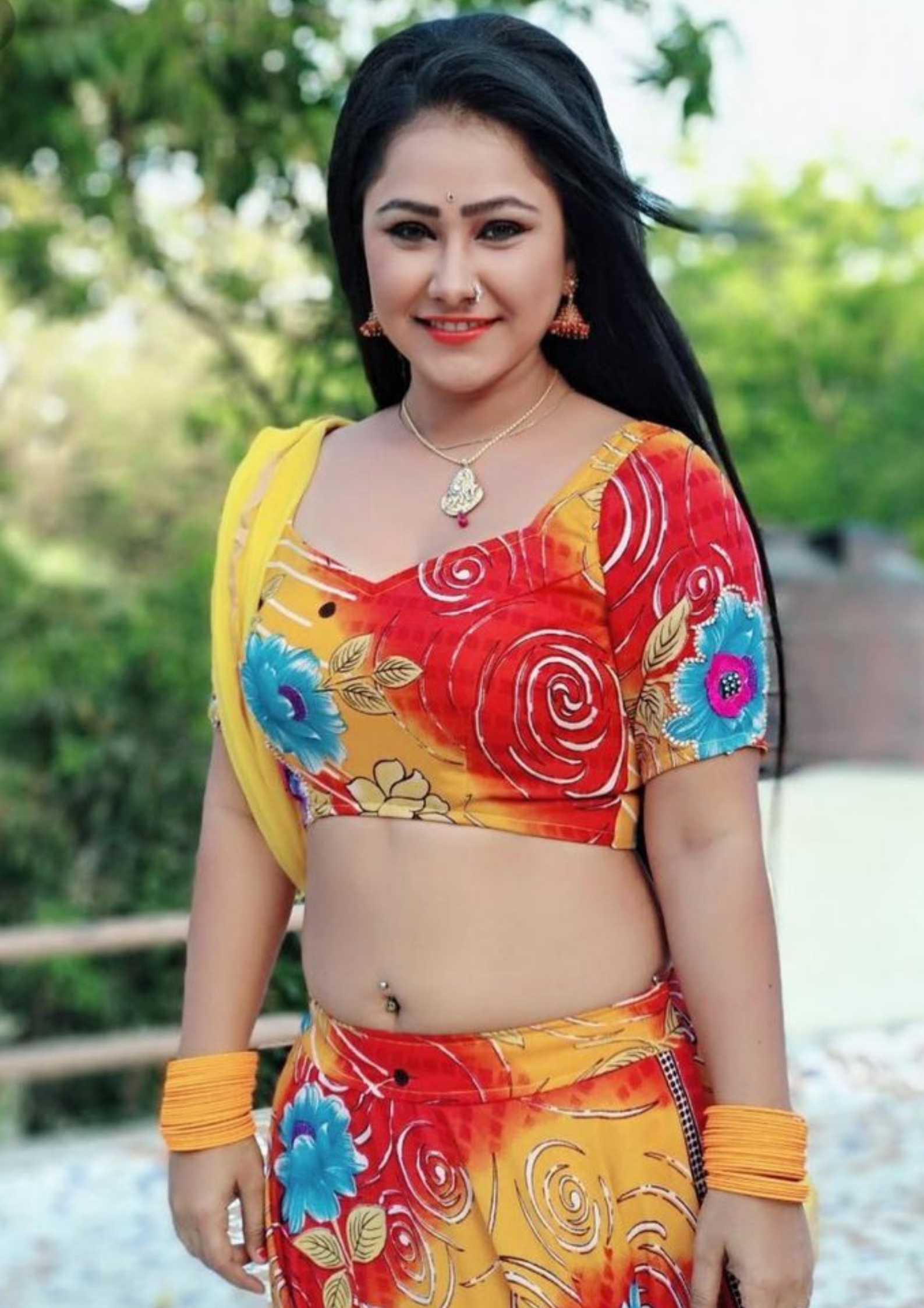 Vertical HD portrait of Bhojpuri actress resembling Priyanka Pandit in Sexy Dress with Sexy and hot looks