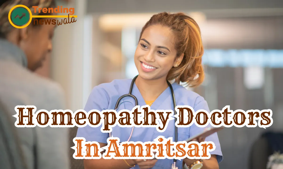 Homeopathy Doctors In Amritsar, A Female Doctor Smiling and Talking to her Patience