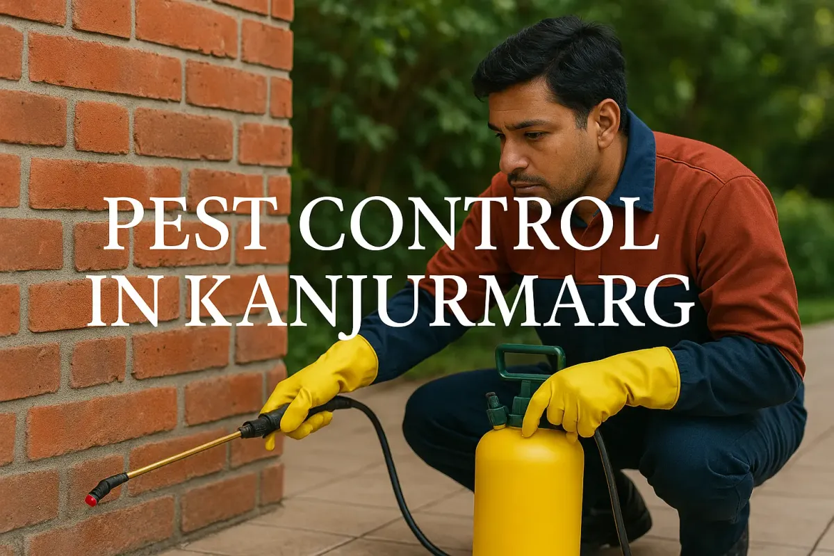 Pest control technician in Kanjurmarg spraying wall with white bold text overlay.
