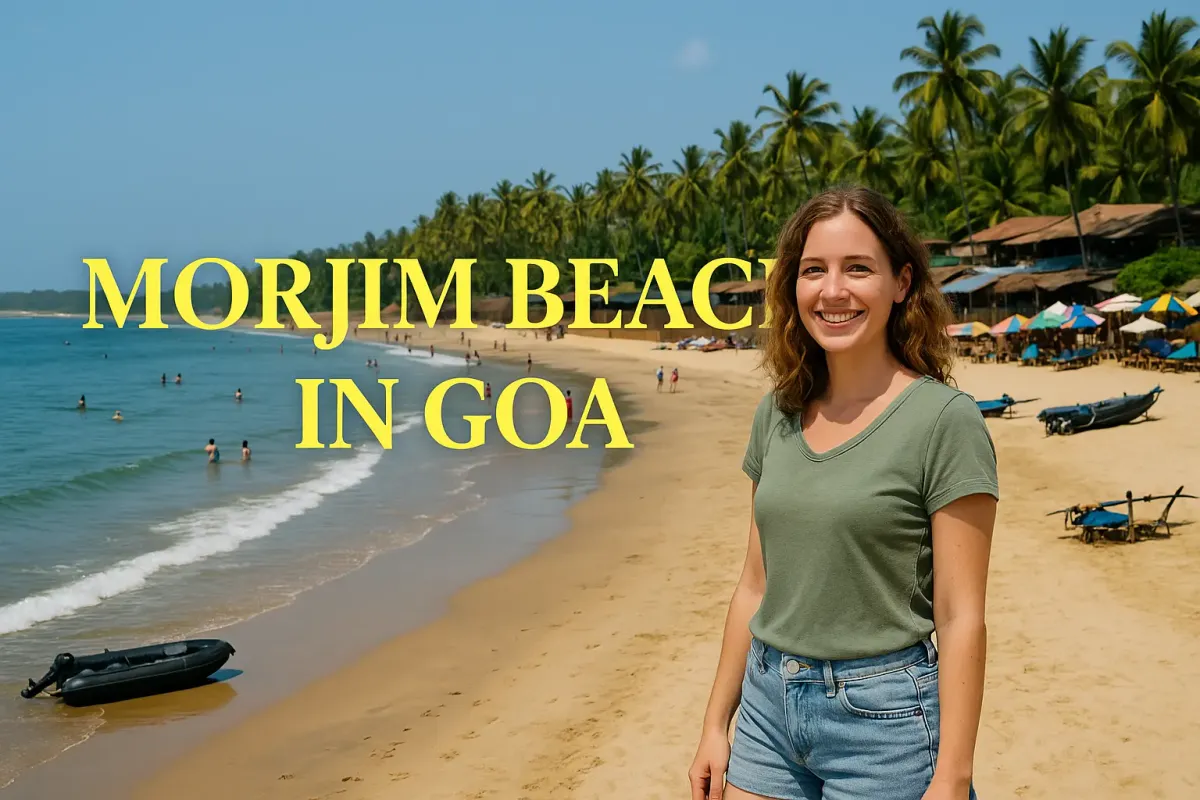 Smiling woman in shorts at Morjim Beach in Goa with Lora font text and colorful tropical beach background.